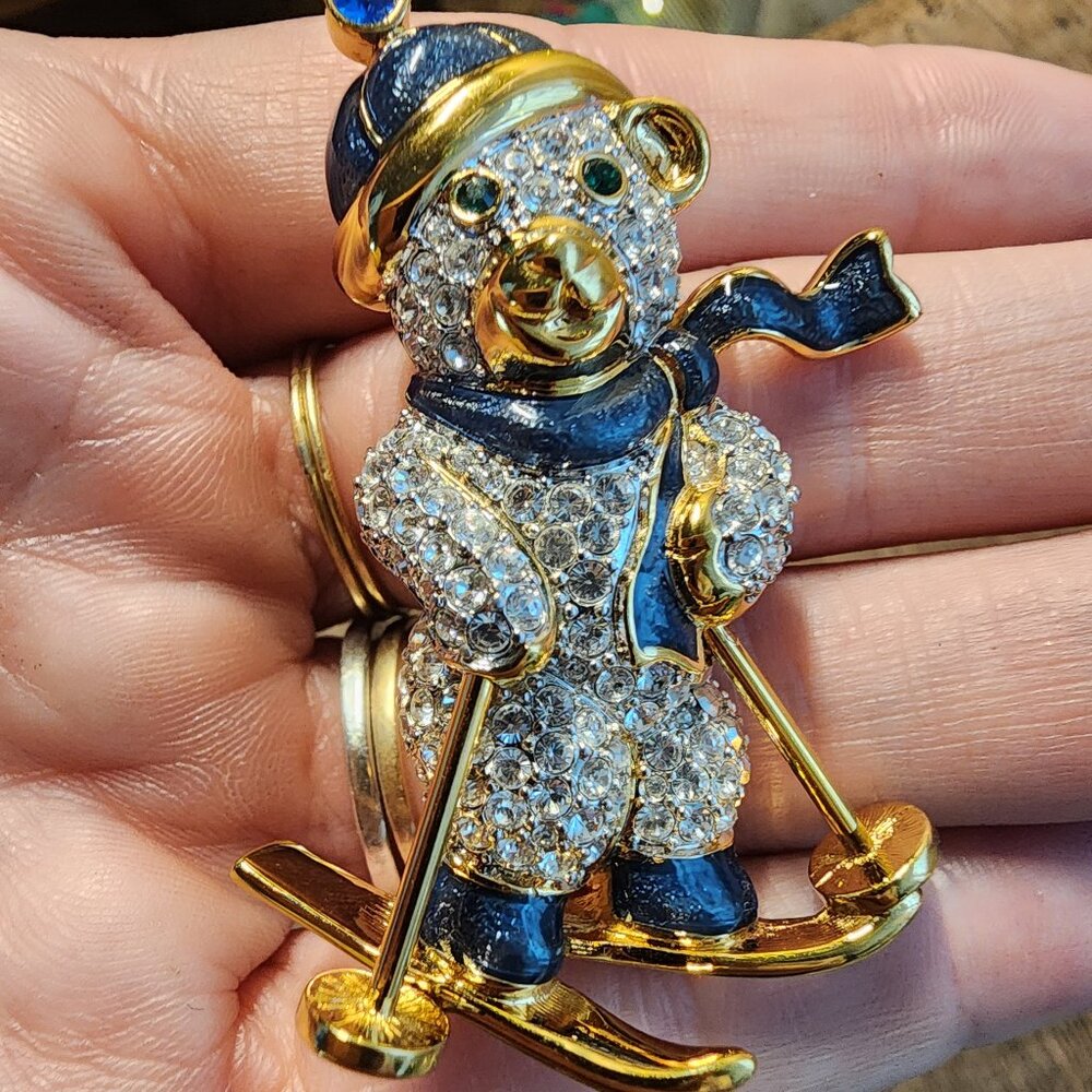 Swarovski crystal bear skiing brooch.